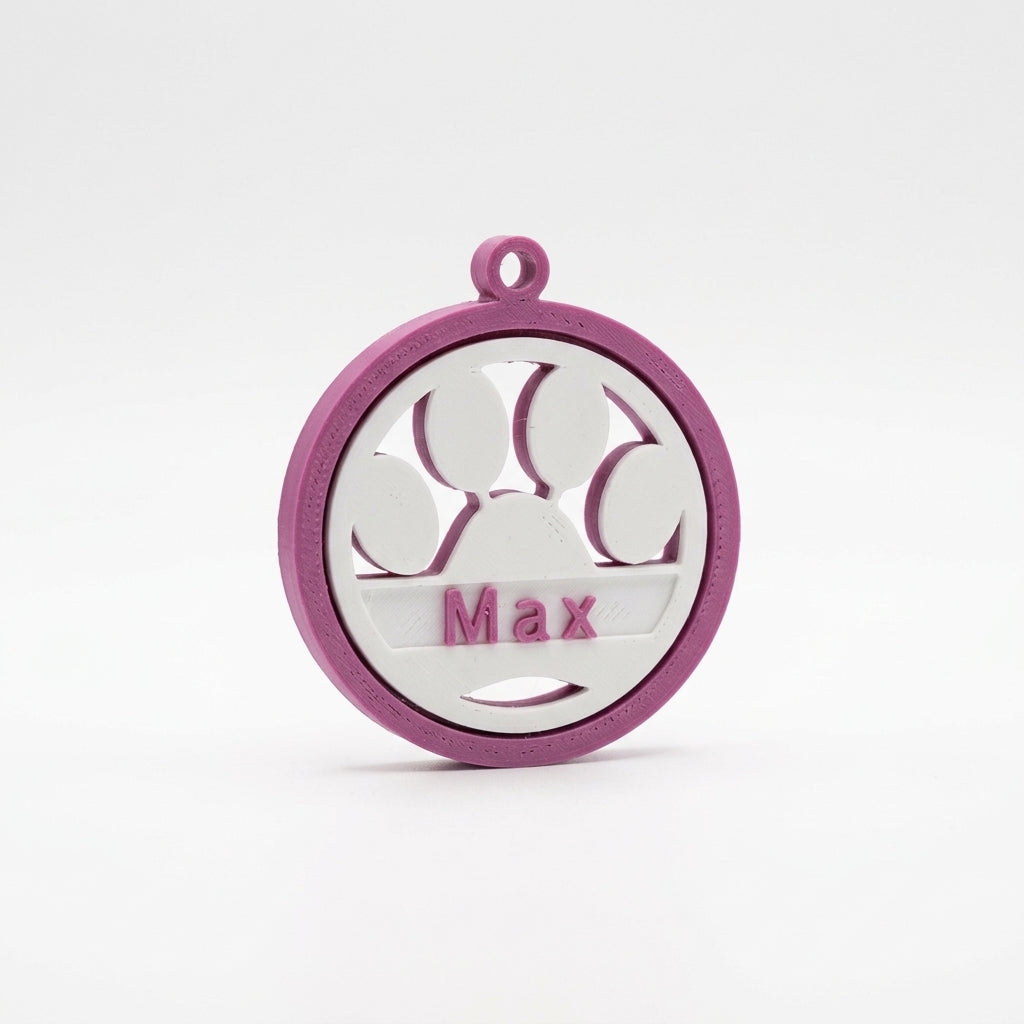 Keychain with paw print design and name engraved