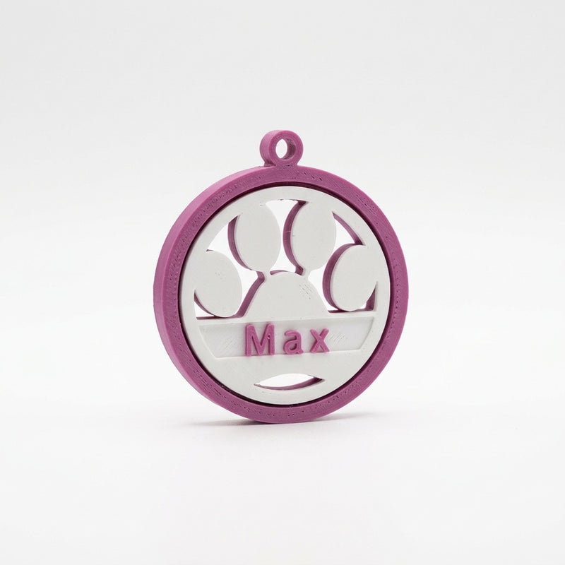 Keychain with paw print design and name engraved