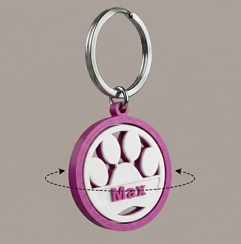 Keychain with paw print design and name engraved